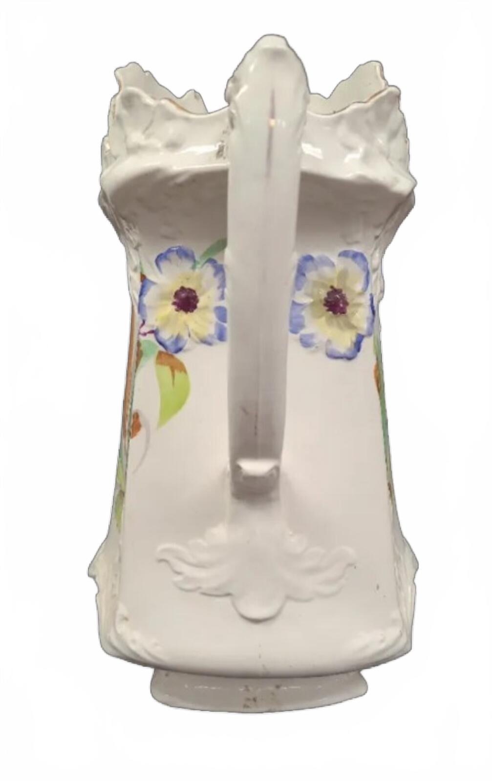 Vintage Ceramic Pitcher with Hand-Painted Floral Design and Scalloped Rim