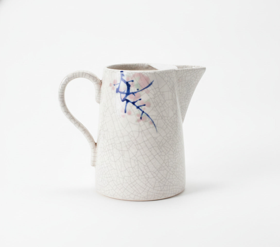 Vintage Ceramic Pitcher with Crackle Glaze and Blue Branch Design