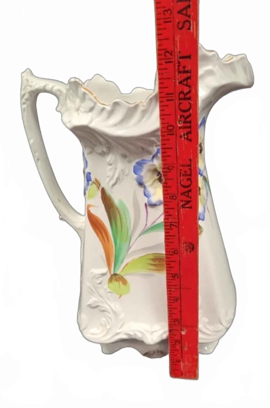 Vintage Ceramic Pitcher with Hand-Painted Floral Design and Scalloped Rim
