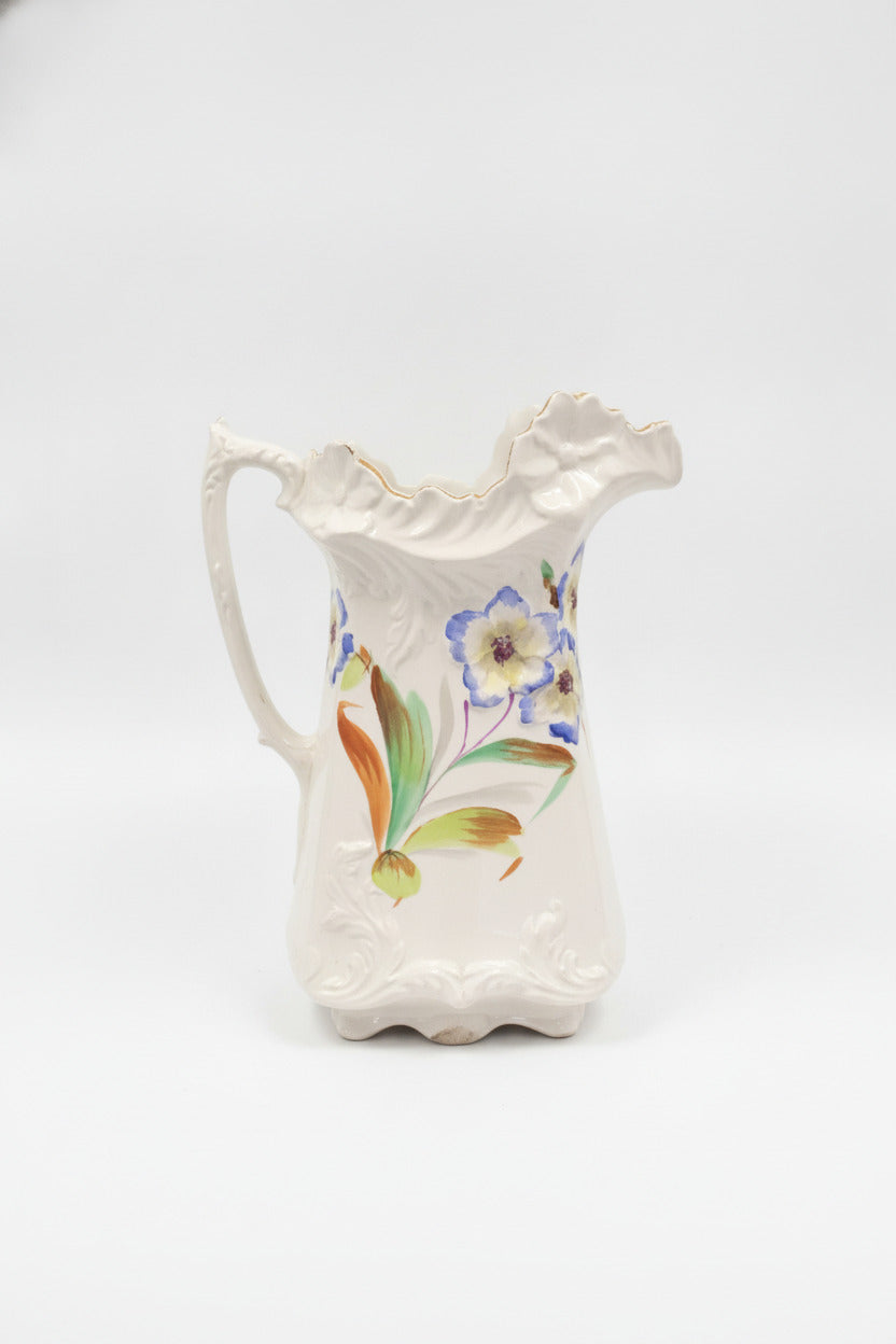 Vintage Ceramic Pitcher with Hand-Painted Floral Design and Scalloped Rim