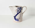 Vintage Ceramic Pitcher with Crackle Glaze and Blue Branch Design